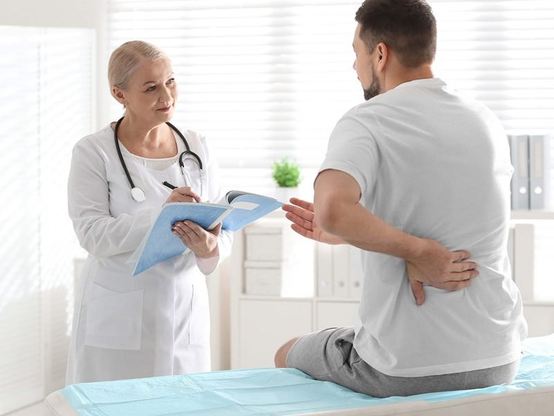 Clinician reviewing a treatment plan with a patient